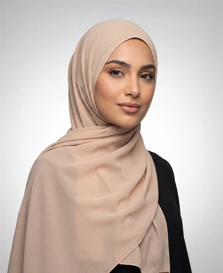 Crafted from luxurious champagne crepe georgette Hijab with a delicate texture, ABAQY Georgette Crepe Hijabs offer lightweight comfort. Available in over 12 shades, they cater to various wardrobe preferences and styles, perfect for both daytime and evening wear.