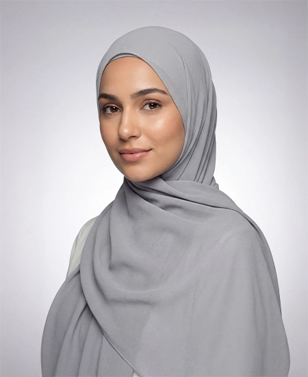 Crafted from luxurious cloud grey crepe georgette Hijab with a delicate texture, ABAQY Georgette Crepe Hijabs offer lightweight comfort. Available in over 12 shades, they cater to various wardrobe preferences and styles, perfect for both daytime and evening wear.