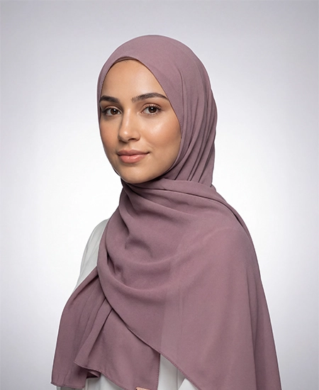Crafted from luxurious dusty mauve crepe georgette Hijab with a delicate texture, ABAQY Georgette Crepe Hijabs offer lightweight comfort. Available in over 12 shades, they cater to various wardrobe preferences and styles, perfect for both daytime and evening wear.