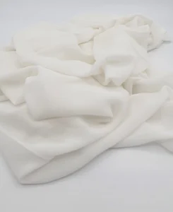 Introducing our Ivory Crepe Chiffon Hijab, crafted from smooth, soft, and non-transparent fabric. This lightweight hijab offers an elegant drape for a sophisticated look, perfect for those who value both comfort and style.