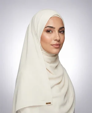 Crafted from luxurious Ivory crepe georgette Hijab with a delicate texture, ABAQY Georgette Crepe Hijabs offer lightweight comfort. Available in over 12 shades, they cater to various wardrobe preferences and styles, perfect for both daytime and evening wear.
