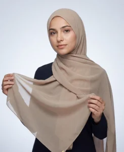 Introducing our Premium Dark Nude Chiffon Hijab, crafted from smooth, soft, and non-transparent fabric. This lightweight hijab offers an elegant drape for a sophisticated look, perfect for those who value both comfort and style.