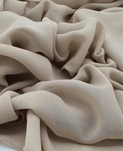 Introducing our Premium Dark Nude Chiffon Hijab, crafted from smooth, soft, and non-transparent fabric. This lightweight hijab offers an elegant drape for a sophisticated look, perfect for those who value both comfort and style.