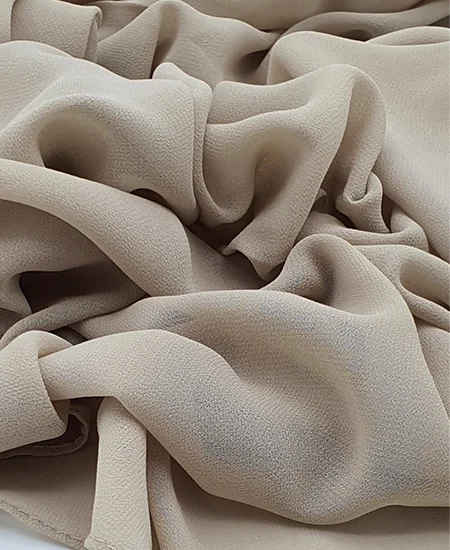 Introducing our Premium Dark Nude Chiffon Hijab, crafted from smooth, soft, and non-transparent fabric. This lightweight hijab offers an elegant drape for a sophisticated look, perfect for those who value both comfort and style.