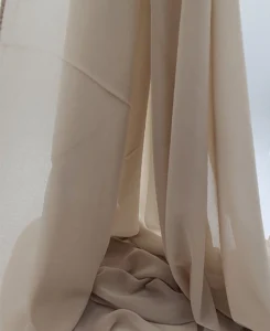 Introducing our Premium Dark Nude Chiffon Hijab, crafted from smooth, soft, and non-transparent fabric. This lightweight hijab offers an elegant drape for a sophisticated look, perfect for those who value both comfort and style.