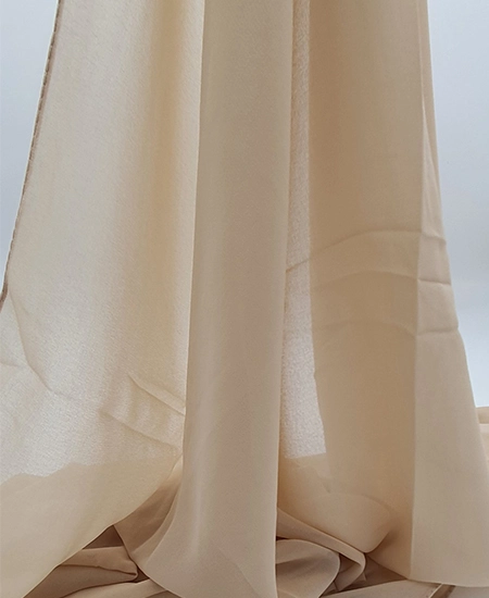 Introducing our Premium Light French Beige Chiffon Hijab, crafted from smooth, soft, and non-transparent fabric. This lightweight hijab offers an elegant drape for a sophisticated look, perfect for those who value both comfort and style.