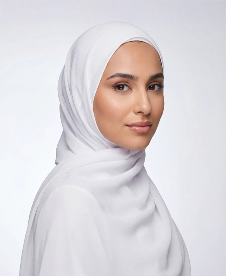 Introducing our White Crepe Chiffon Hijab, crafted from smooth, soft, and non-transparent fabric. This lightweight hijab offers an elegant drape for a sophisticated look, perfect for those who value both comfort and style.