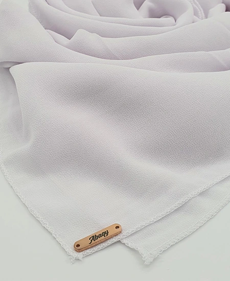 Introducing our White Crepe Chiffon Hijab, crafted from smooth, soft, and non-transparent fabric. This lightweight hijab offers an elegant drape for a sophisticated look, perfect for those who value both comfort and style.
