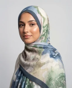 The Emerald Tides Printed Shawl by Sunset Hijab is a soft, lightweight hijab, perfect for adding a stylish and comfortable touch to your look. Its vibrant design makes it ideal for any occasion.
